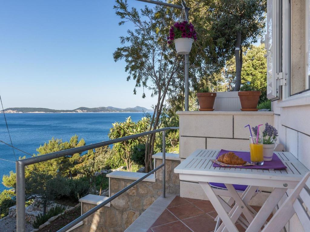 Image of Apartments Lovro – Duplex One Bedroom Apartment with Terrace and Partial Sea View 1
