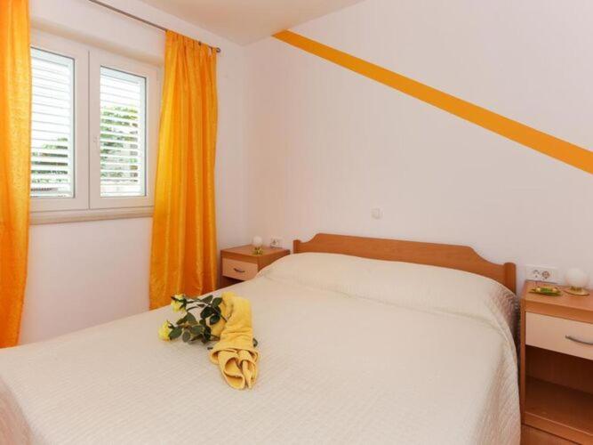 Image 1 of Apartments Pojko – One-Bedroom Apartment with Terrace Yellow