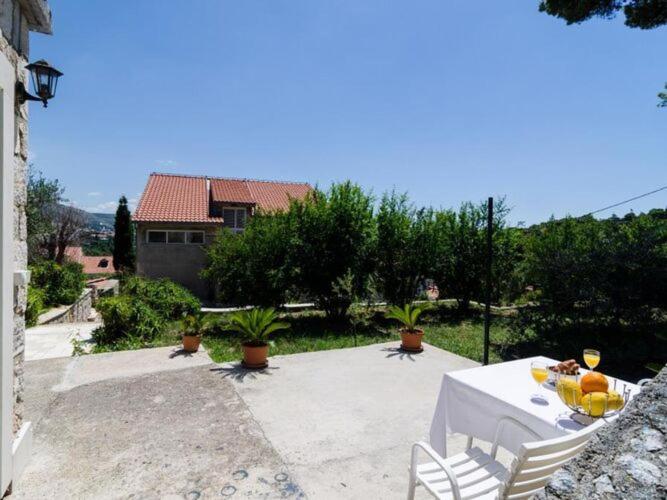 Image of Apartments & Rooms Tapera- Comfort One-Bedroom Apartment with Terrace and Garden View