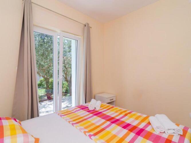 Image 5 of Apartments & Rooms Tapera- Comfort One-Bedroom Apartment with Terrace and Garden View