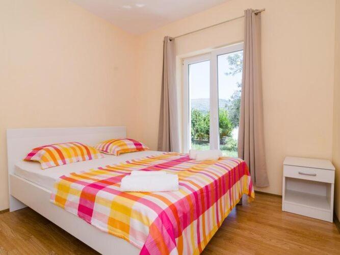 Image 1 of Apartments & Rooms Tapera- Comfort One-Bedroom Apartment with Terrace and Garden View