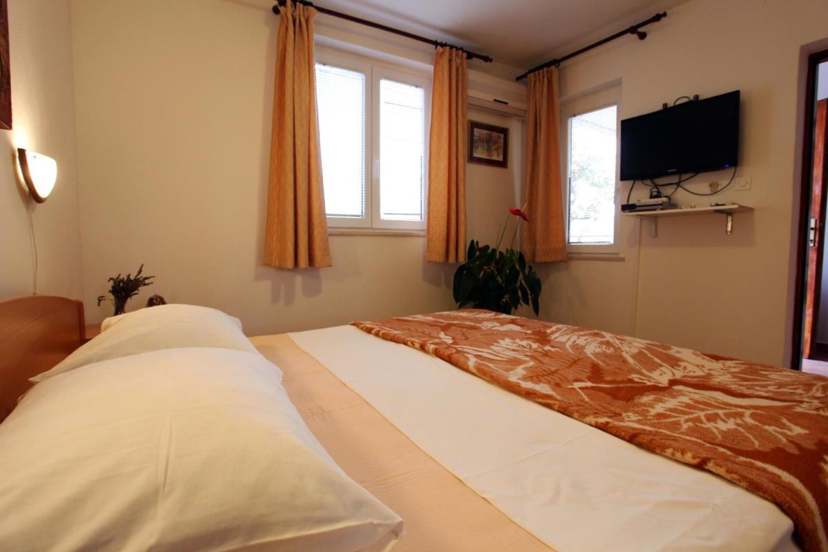 Image 6 of Ferienwohnung Ivana Mitten Im Blumengarten