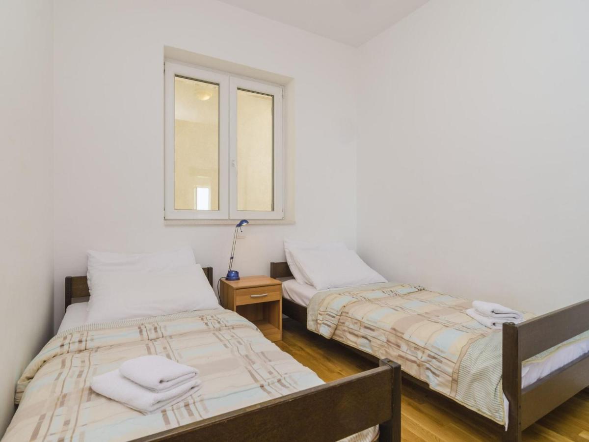 Image 1 of Medi Apartment – Two-Bedroom Apartment with Terrace and Sea View